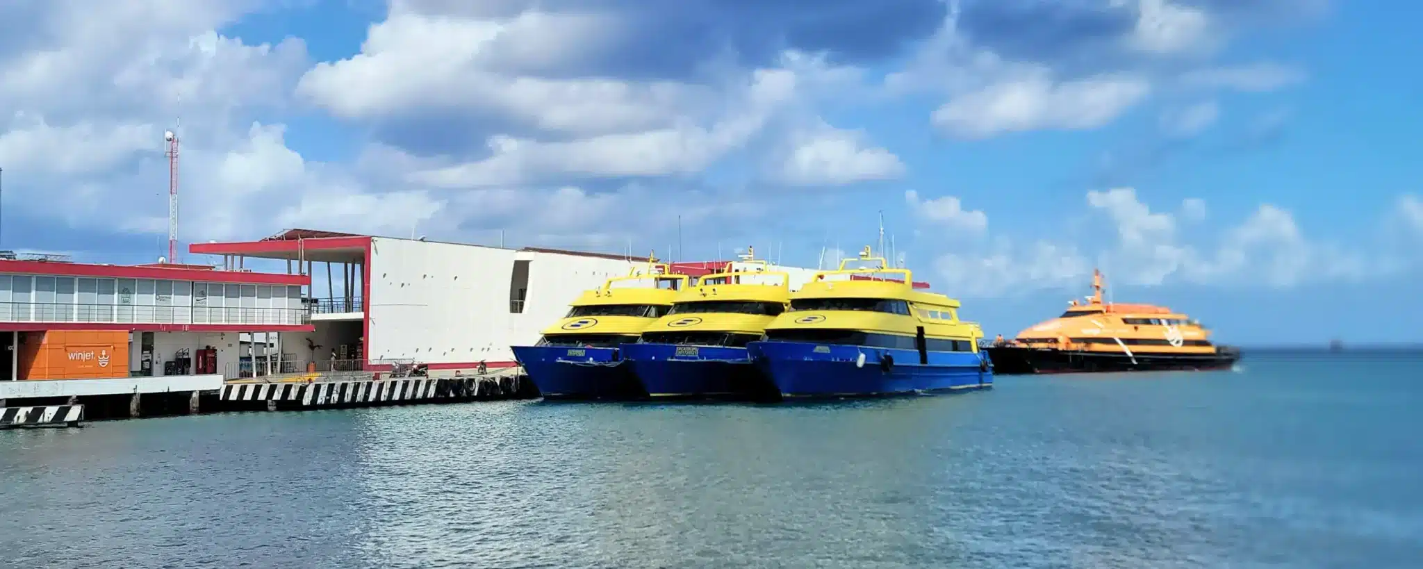 Cozumel ferry port: No passport needed for mainland Mexico travel.