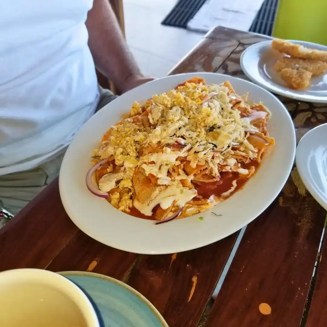 Traditional chilaquiles breakfast served at a Cozumel boutique hotel.