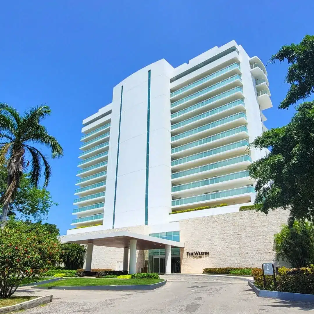 The Westin Cozumel resort, sleek design, ideal for families with teens interested in snorkeling and water activities.
