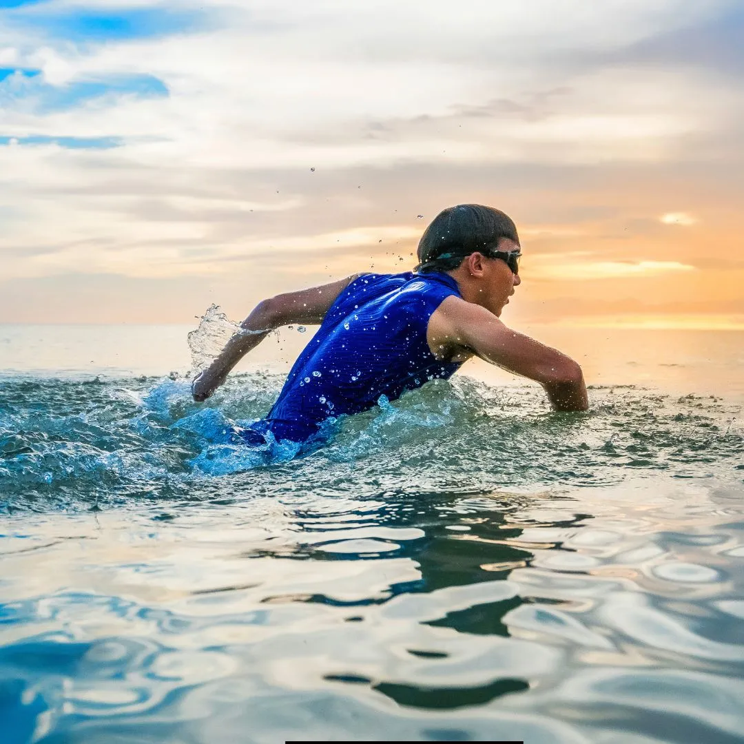 Woman swimming in ocean during Cozumel triathlon event