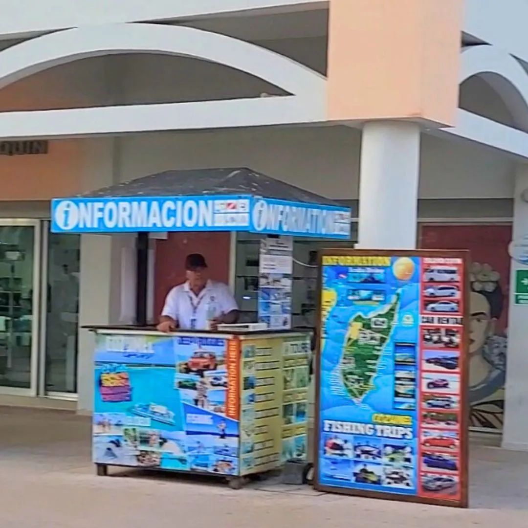 Manned tour booth with listed excursions